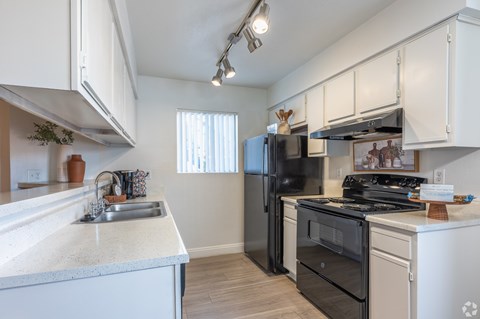Kitchen at Sunset Winds Apartments in Henderson, NV 89014