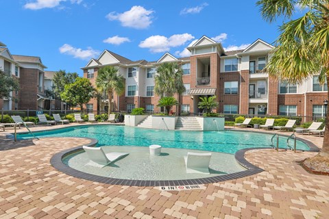 Outdoor Resort Style Pool at Madison on the Meadow Apartments in Stafford, TX 77477