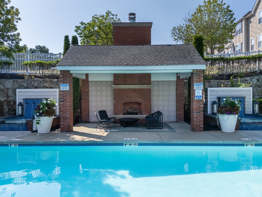 Outdoor Poolside Fireplace at The Residences at Stevens Pond in Saugus, MA 01906