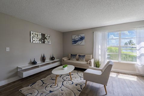 Living Room Space at The Landings at Pembroke Lakes Apartments in Pembroke Pines, FL 33025
