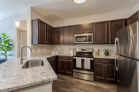 Renovated Kitchen at The Tribute Apartments in Raleigh, NC 27612