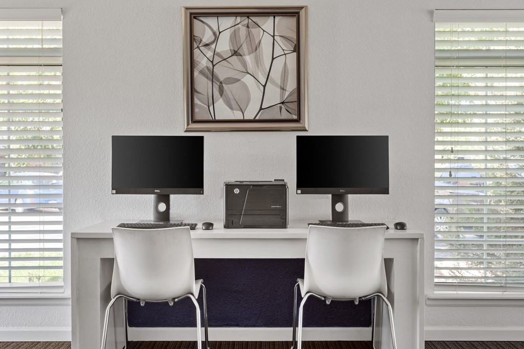 a white desk with two monitors and two chairs  at Verona, Littleton, Colorado