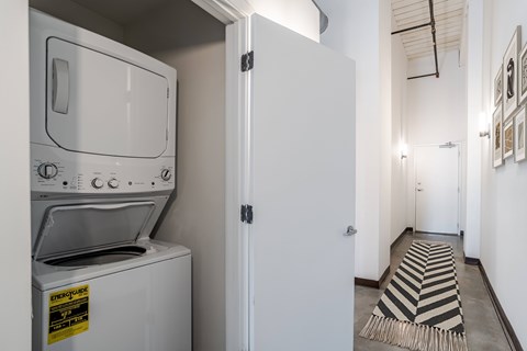 stacked washer and dryer at Highland Mill Lofts in Charlotte, NC 28205