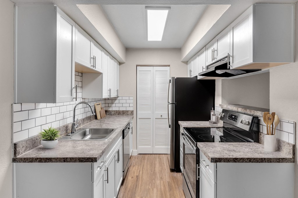 Kitchen with plenty of storage at Verona Apartments in Littleton, CO