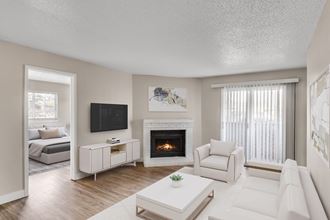 Living Room with Fireplace at Verona Apartments in Littleton, CO