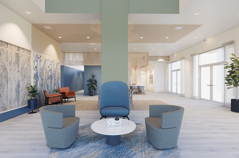 A modern waiting room with blue chairs and a patterned wallpaper.
