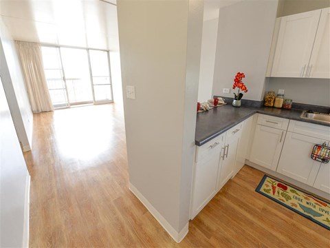 Kitchen With White Cabinets at Waikele Towers, Waipahu, 96797