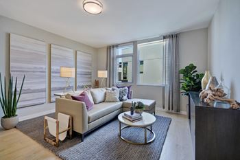 a living room with a couch and a coffee table at L Seven, California