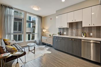 a kitchen and living room in an apartment at L Seven, San Francisco, California 94103