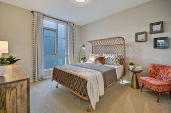 a bedroom with a bed and a window at L Seven, California, 94103
