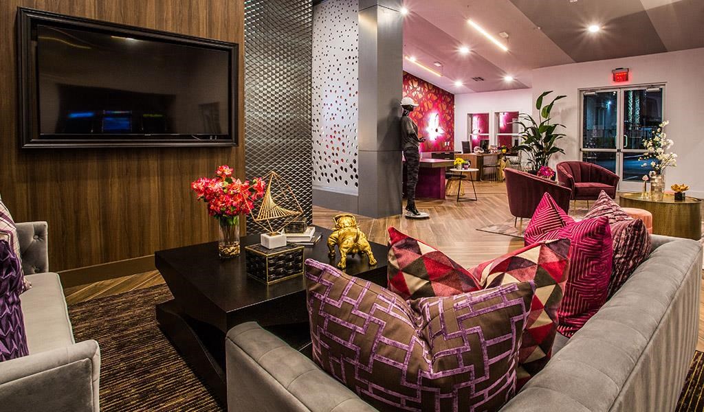 a living room with a couch and a television