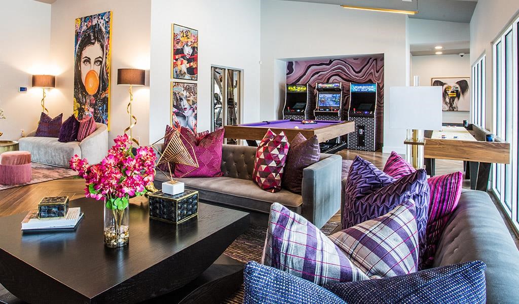 a living room with a couch and a table