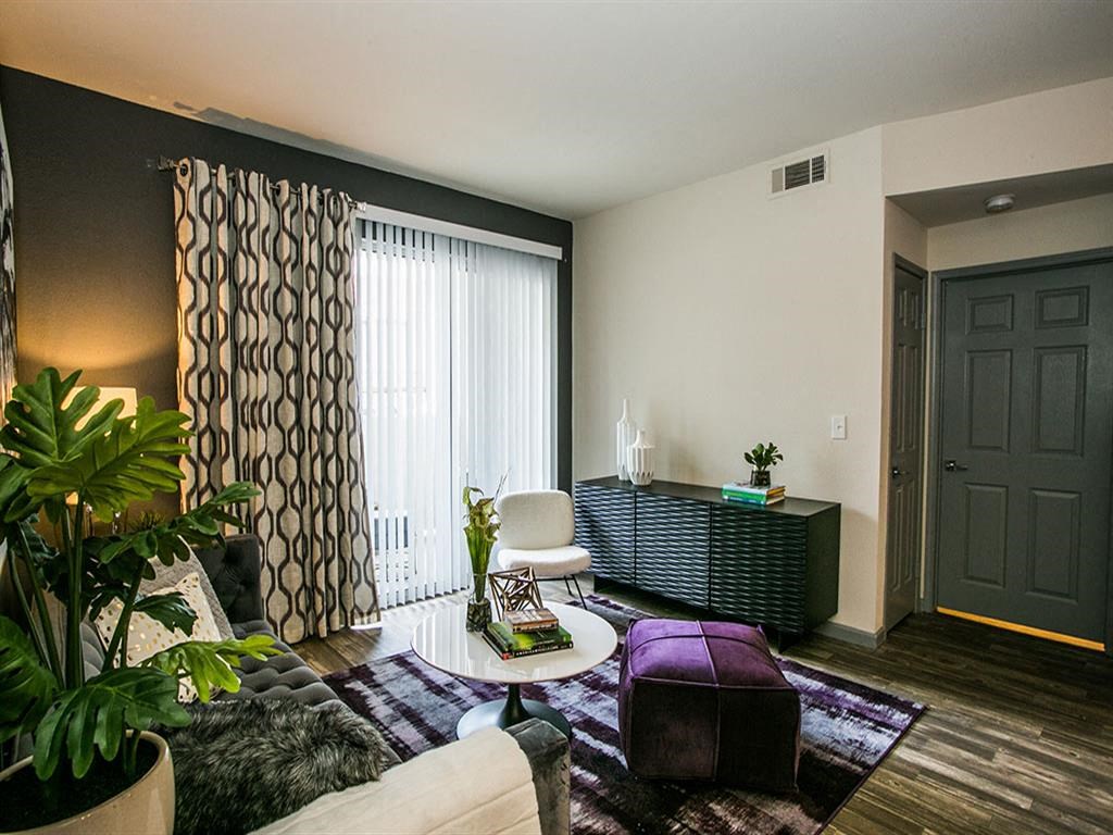 a living room with a couch and a table