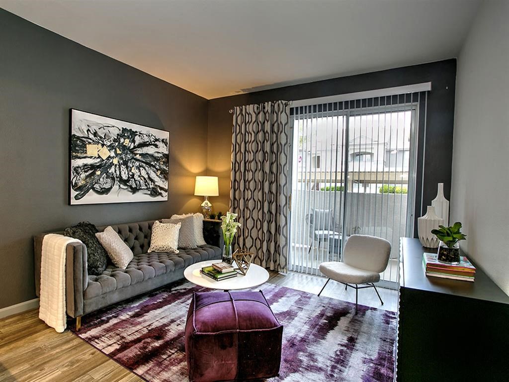 a living room with a couch and a table