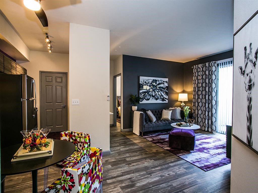 a living room with a couch and a table