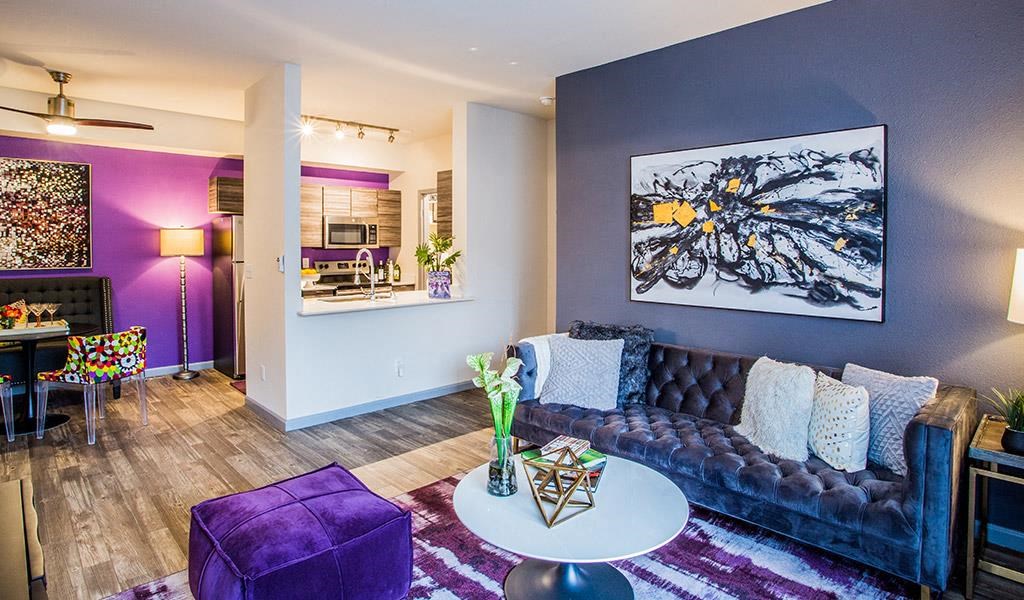 a living room with a couch and a table