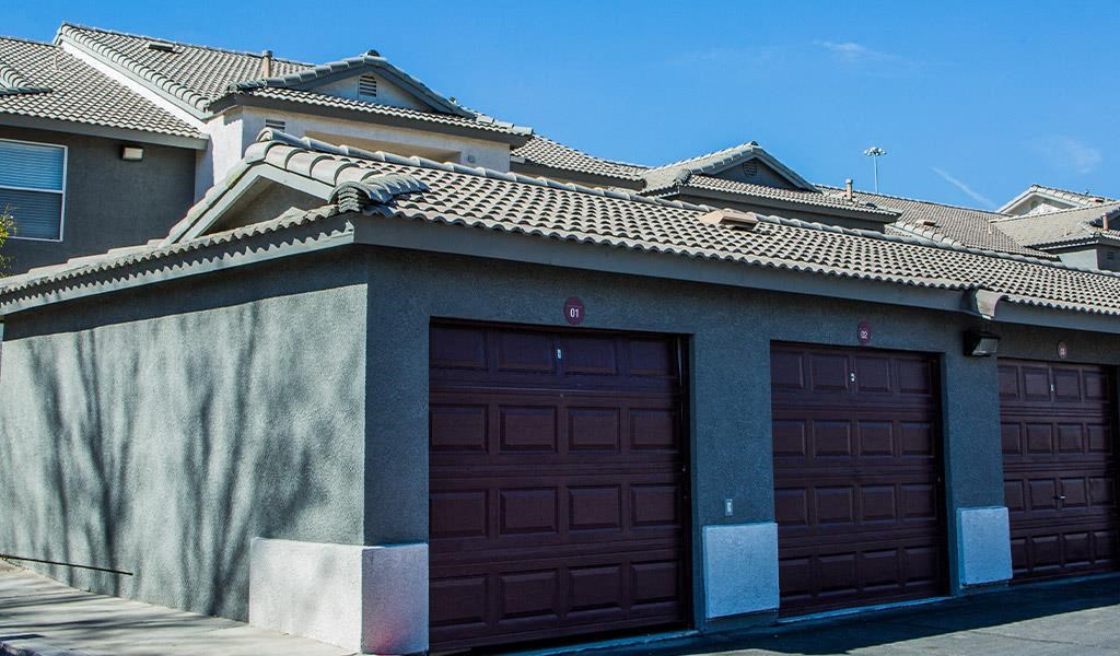 two garage doors on the side of a building