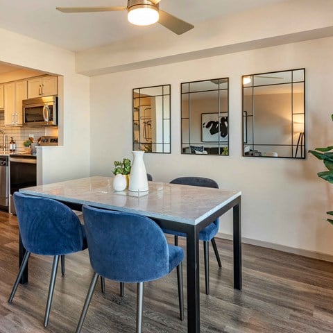 a dining room with a table and chairs at The Rays at Vegas Towers Apartments, Nevada, 89119