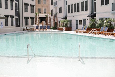swimming pool in front of apartments at The Merchant Apartments, South Carolina