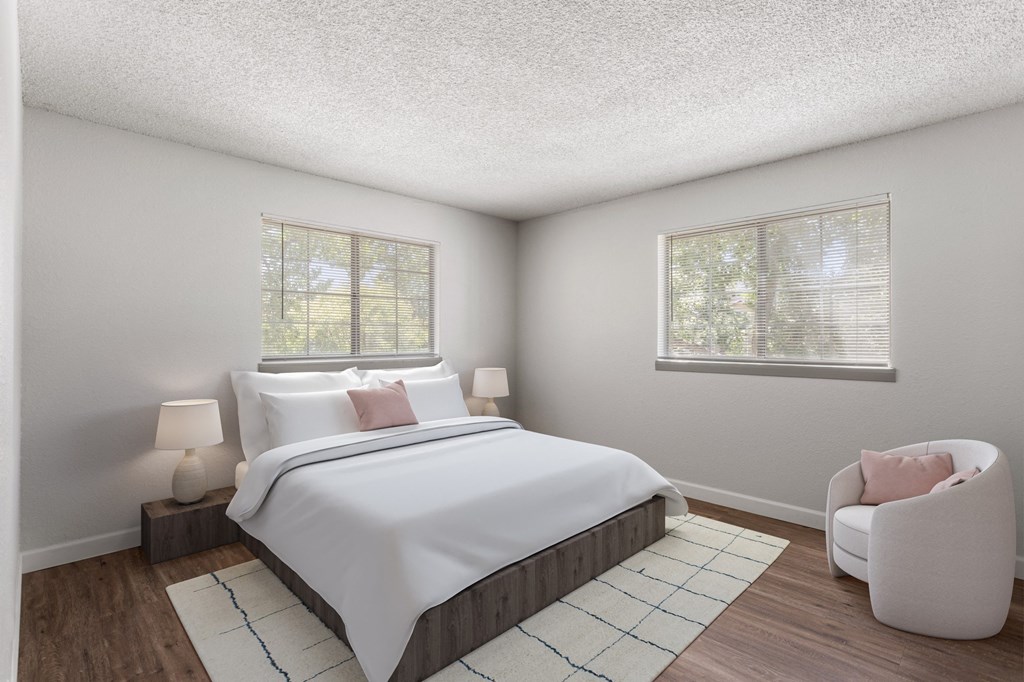 a white bedroom with a large bed and two windows  at Verona, Littleton, CO