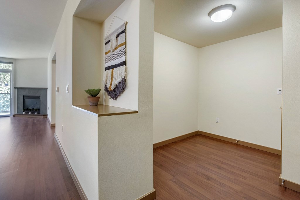 a work from home space with hardwood floors and a fireplace  at 128 on State, Kirkland