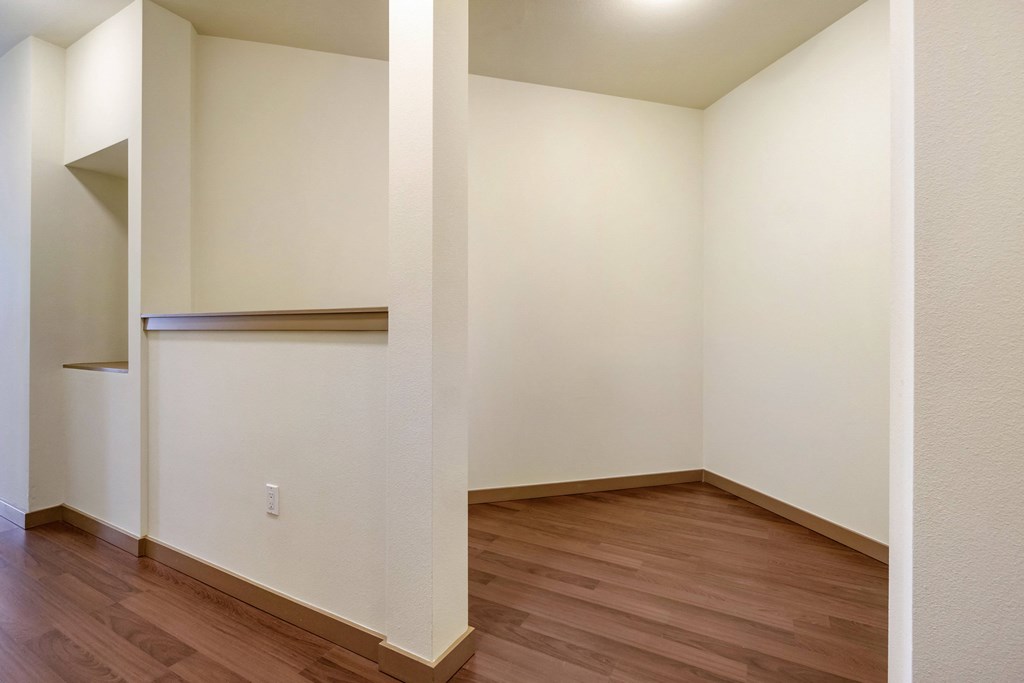 a work from home nook with hardwood flooring and white walls  at 128 on State, Kirkland, Washington