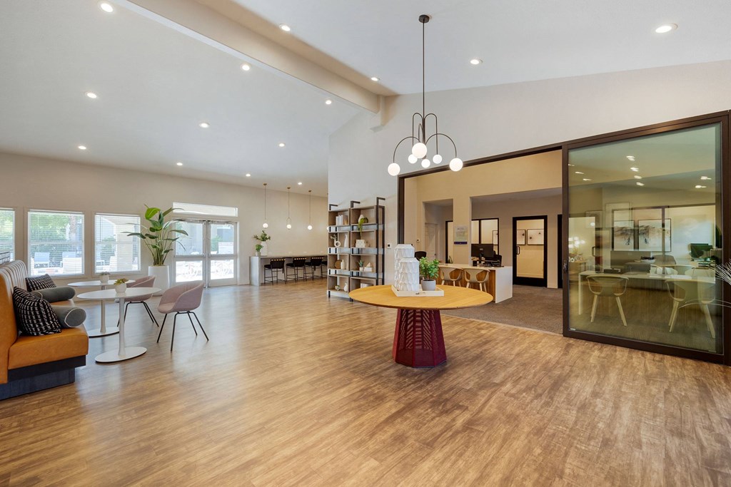 a large living room with a table and a dining room at Paisley and Pointe Apartments, Las Vegas, NV 89130
