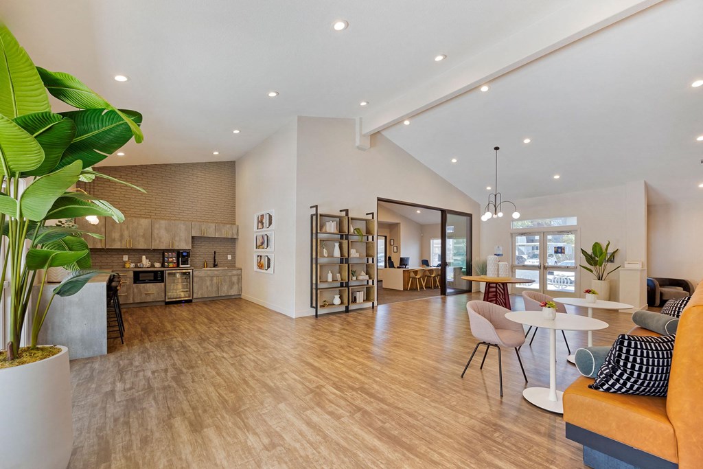 a living room and dining room with a table and chairs at Paisley and Pointe Apartments, Nevada, 89130