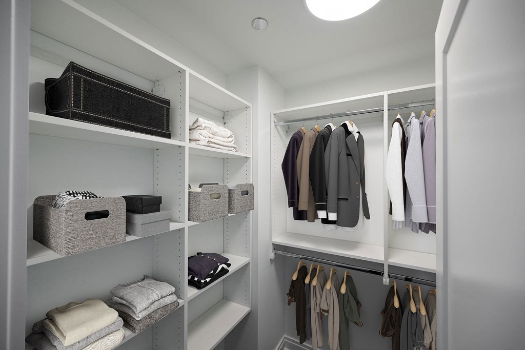 a walk in closet with a lot of shelves and clothes  at The Belden Stratford, Chicago, 60614