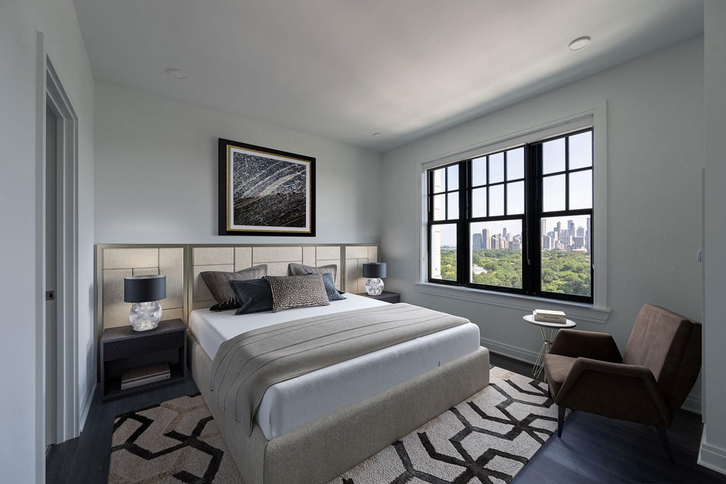 a bedroom with a bed and a window  at The Belden Stratford, Illinois