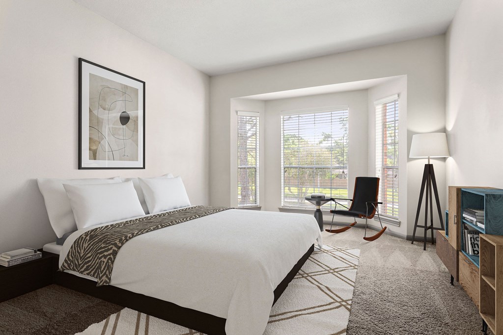 a bedroom with a large bed and a window a bedroom with a large bed and a window at Aston at Cinco Ranch, Texas