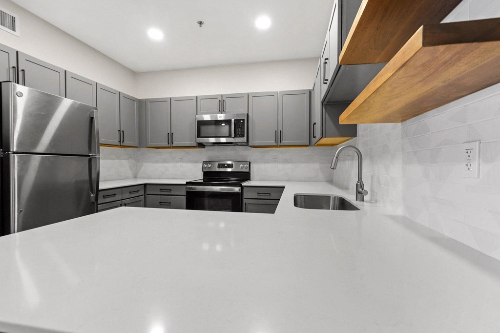 the kitchen is clean and ready for us to use at Switchback on Platte Apartments, Littleton