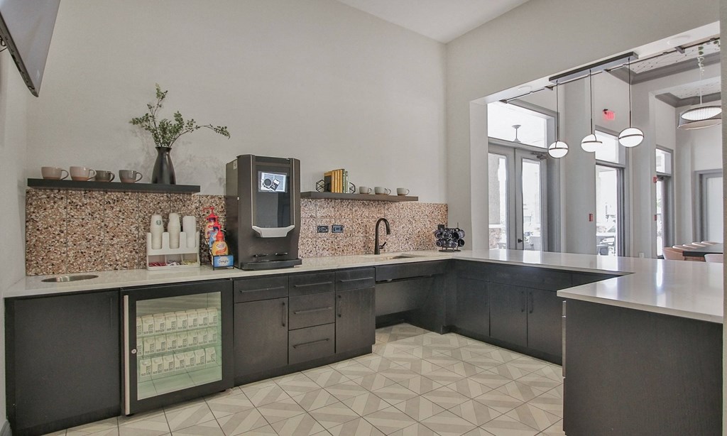 a kitchen with a large counter top and a sink at Sladestone Shadow Creek, Pearland