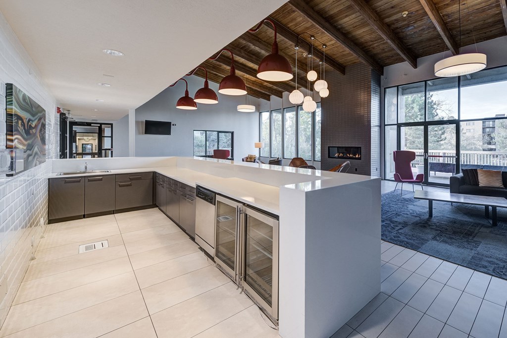 a large kitchen with a large counter top in a house at Ashford Belmar Apartments, Lakewood, CO