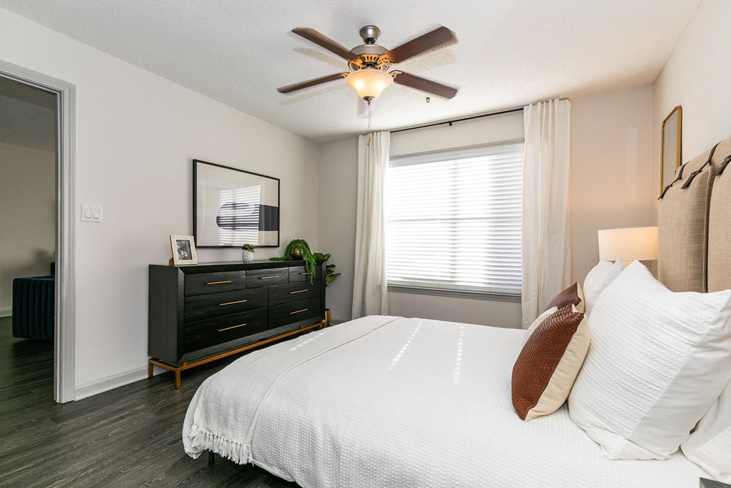 bedroom with large bed and ceiling fan bedroom with large bed and ceiling fan at Briarcliff Apartments, Georgia, 30329