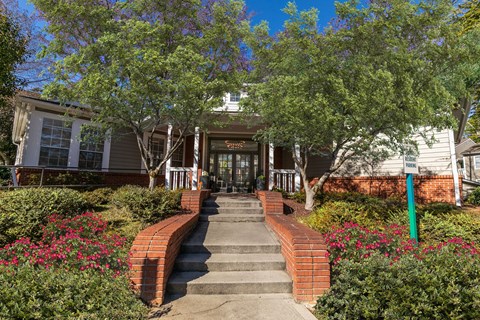 the front of a house with stairs and a sidewalk at Briarcliff Apartments, Atlanta, 30329