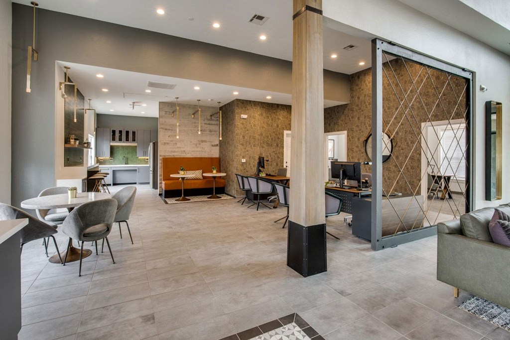 the lobby with tables and chairs at Carrington at Barker Cypress, Cypress, TX, 77433