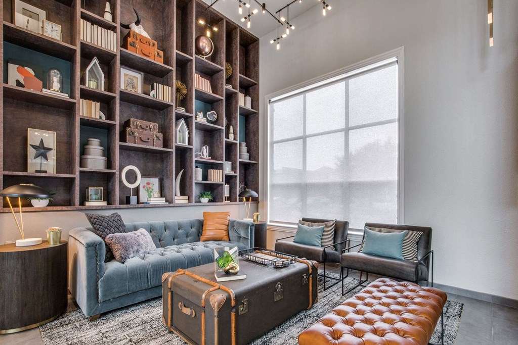 a living room filled with furniture and a large window at Carrington at Barker Cypress, Cypress, TX