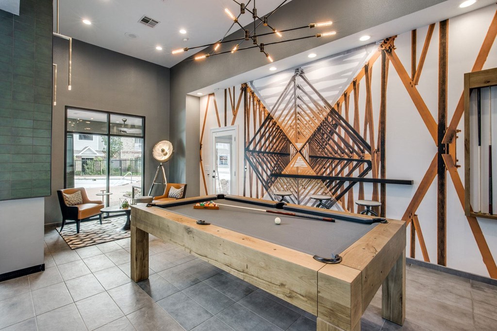 a pool table in the resident lounge at Carrington at Barker Cypress, Texas, 77433