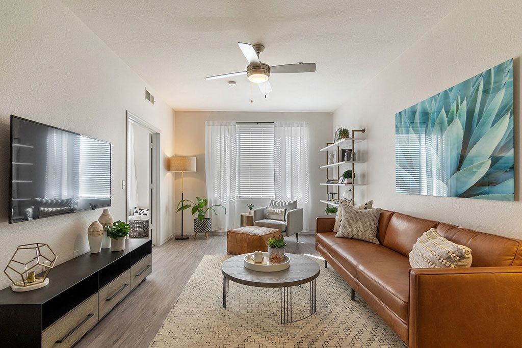 a living room with a couch and a ceiling fan at Element Deer Valley, Phoenix, 85027