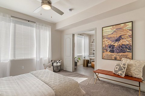 an empty room with a bed and a painting on the wall at Element Deer Valley, Arizona