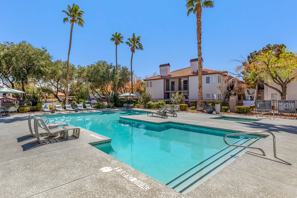 the swimming pool at the enclave apartments