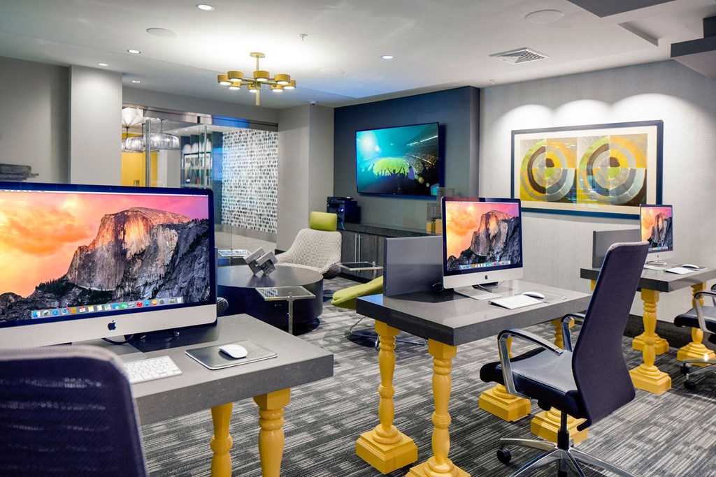 a room with three computer desks and two chairs at Heights at Glen Mills, Glen Mills, PA 19342