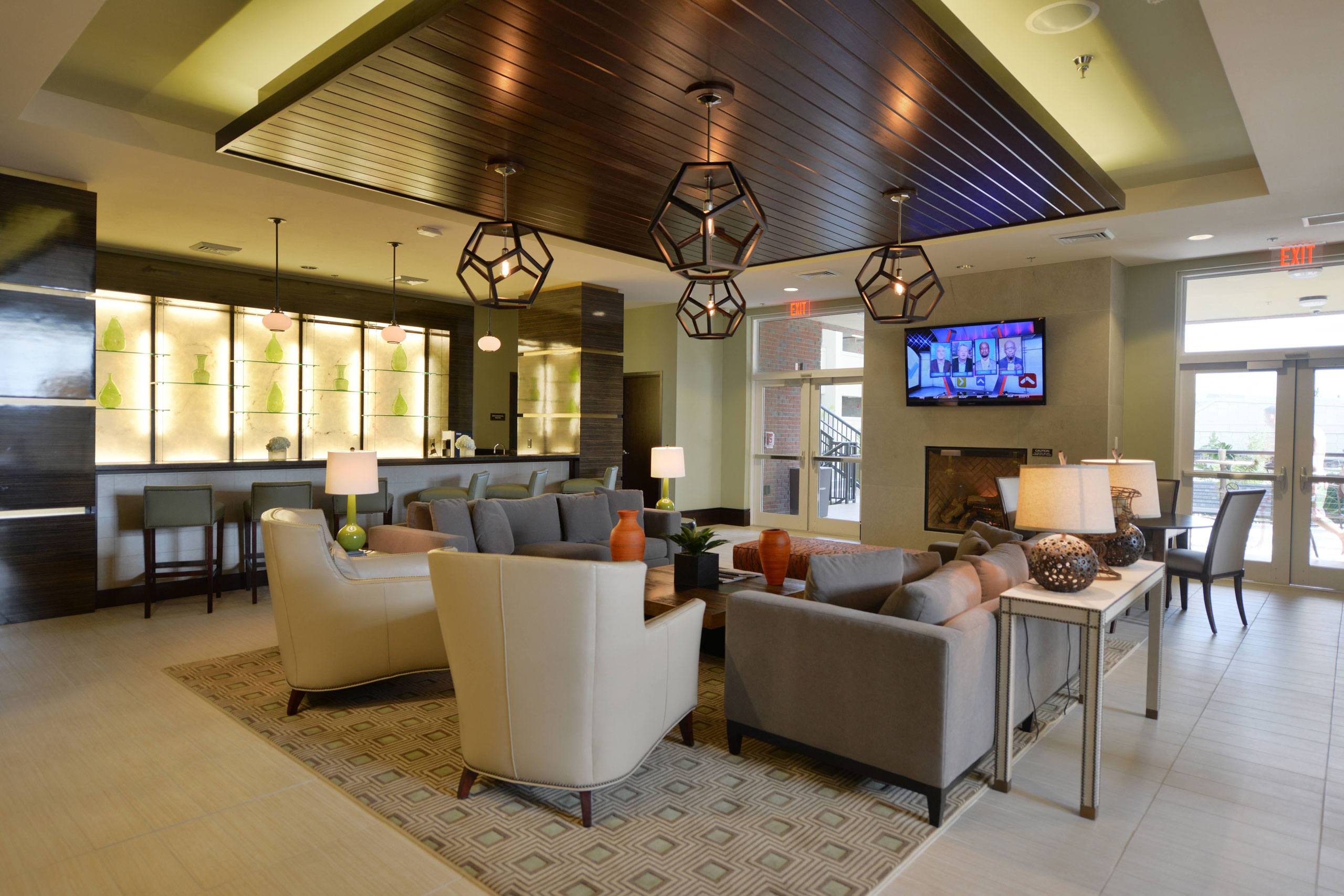 a large lobby with couches and chairs at One Plantation, Florida, 33324