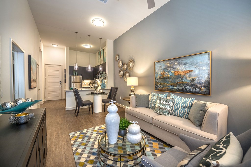 a living room with a couch and a table at South Side Flats, Dallas, 75215