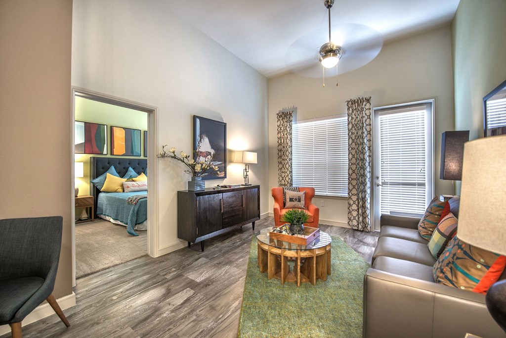 a living room with a couch and a table at South Side Flats, Dallas, TX