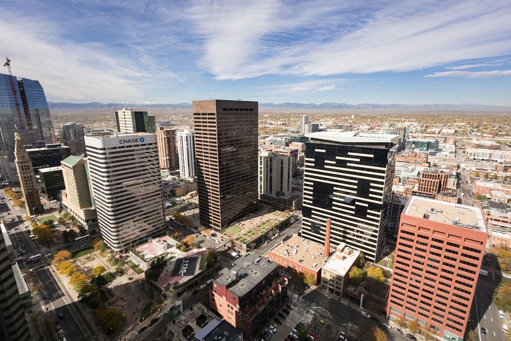 a view of the city from the top of a skyscraper at Apartments at Denver Place, Denver Colorado
