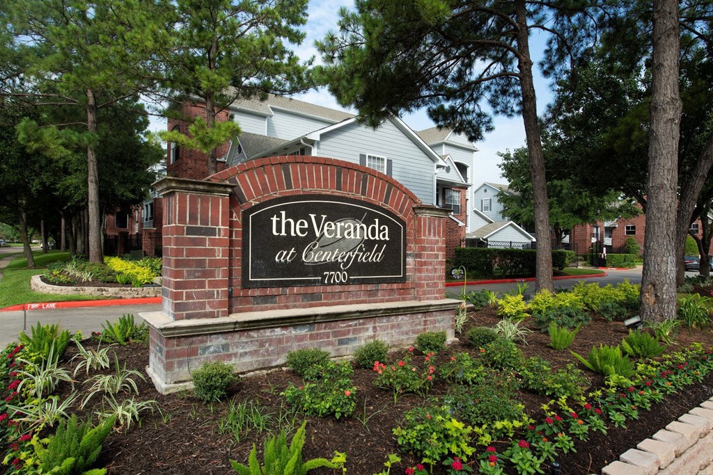 the sign for the apartments at Veranda at Centerfield, Houston