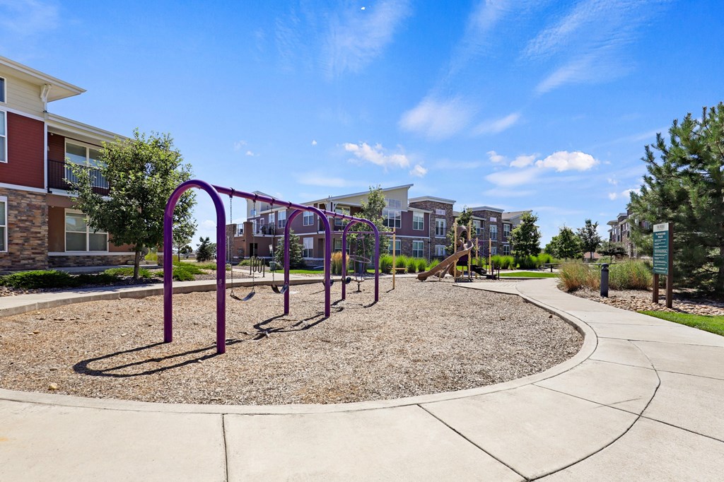 community playground at Apartments at Ridge at Thornton Station Apartments, Colorado, 80229