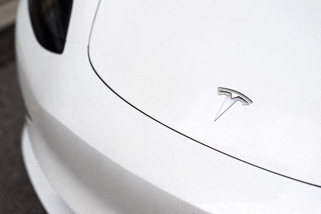 the badge on the side of a white car  at The Belden Stratford, Illinois